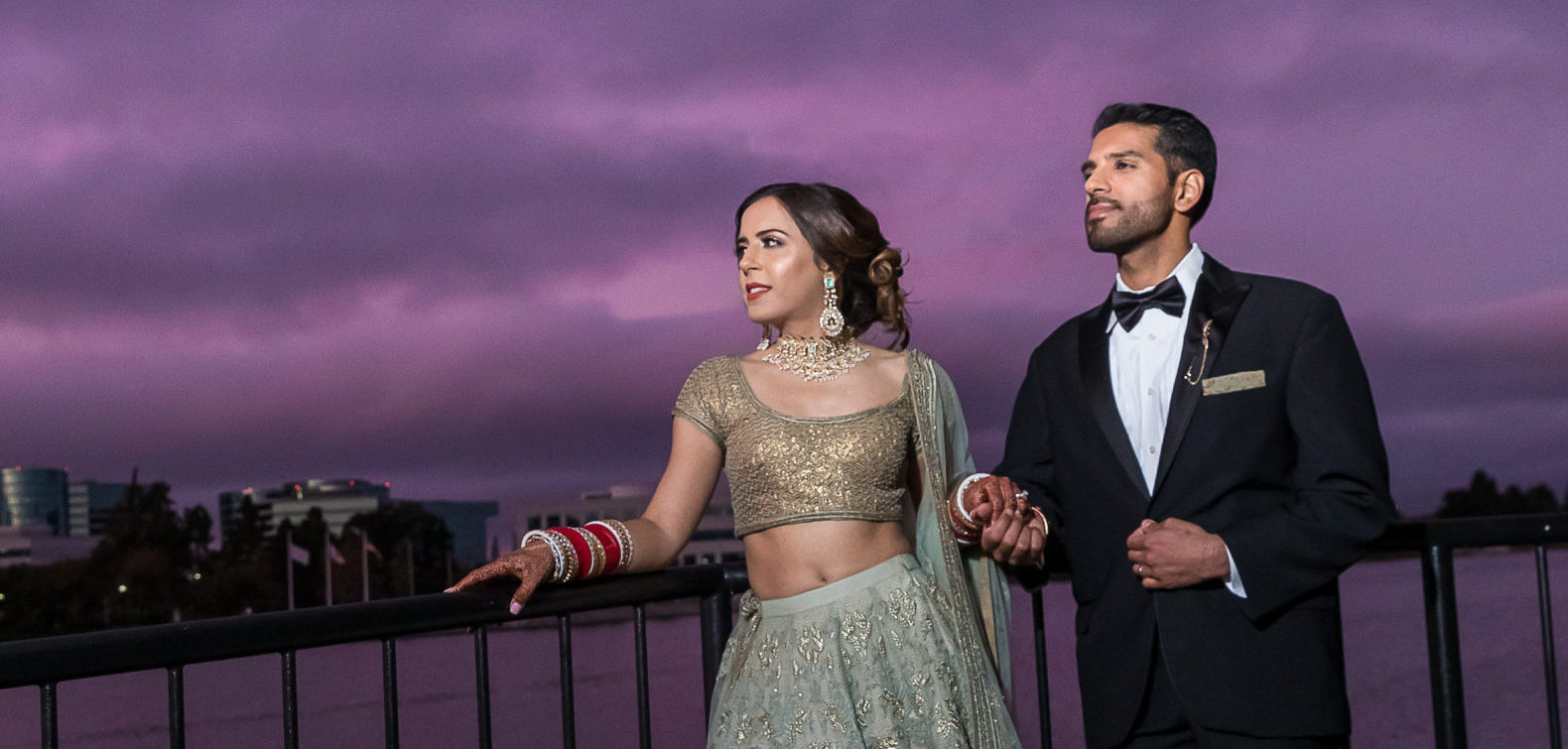 Indian couple take moment away from with each other away their wedding reception